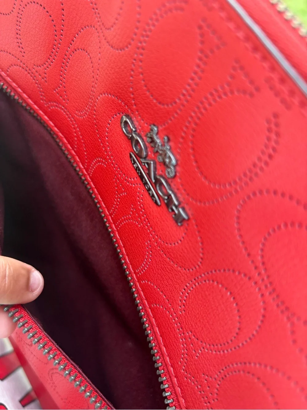 Coach red signature